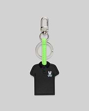 Iconic Polo Keychain featuring a black textured faux leather polo shirt shape with a small embroidered pink and white Psycho Bunny skull logo, attached to a silver metal clasp and key ring with a vibrant neon green strap.
