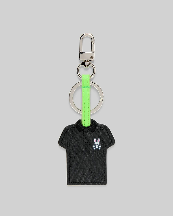 Iconic Polo Keychain featuring a black textured faux leather polo shirt shape with a small embroidered pink and white Psycho Bunny skull logo, attached to a silver metal clasp and key ring with a vibrant neon green strap.