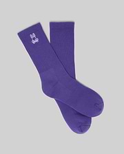 MENS NEW CLASSIC SPORT SOCK, a vibrant purple crew sock featuring a prominent white embroidered Psycho Bunny skull logo on the ribbed cuff, embodying refined streetwear style.