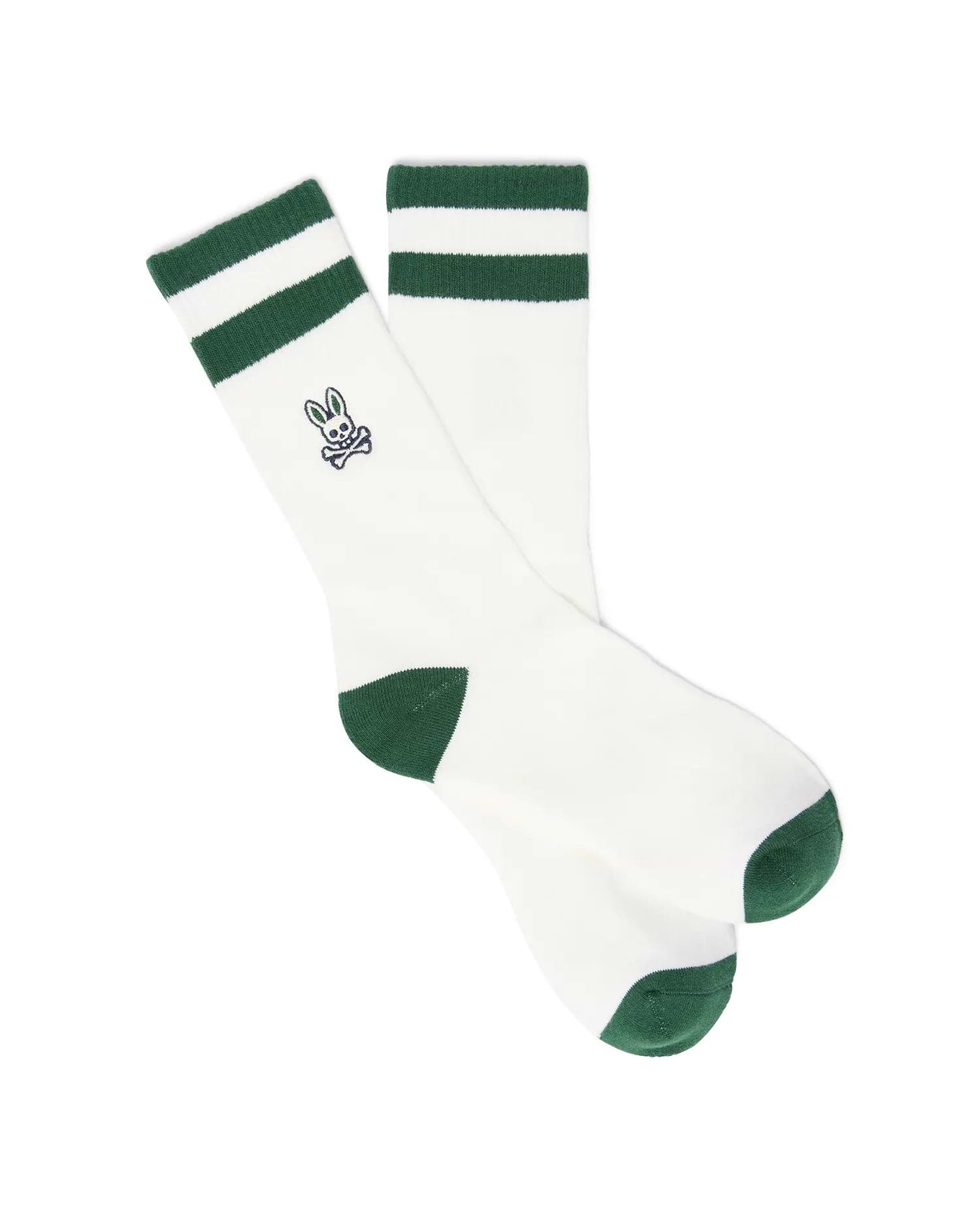 Mens Pal Sport Sock, white knit with two green cuff stripes, green heel and toe, featuring a small embroidered Psycho Bunny skull logo on the outer ankle.