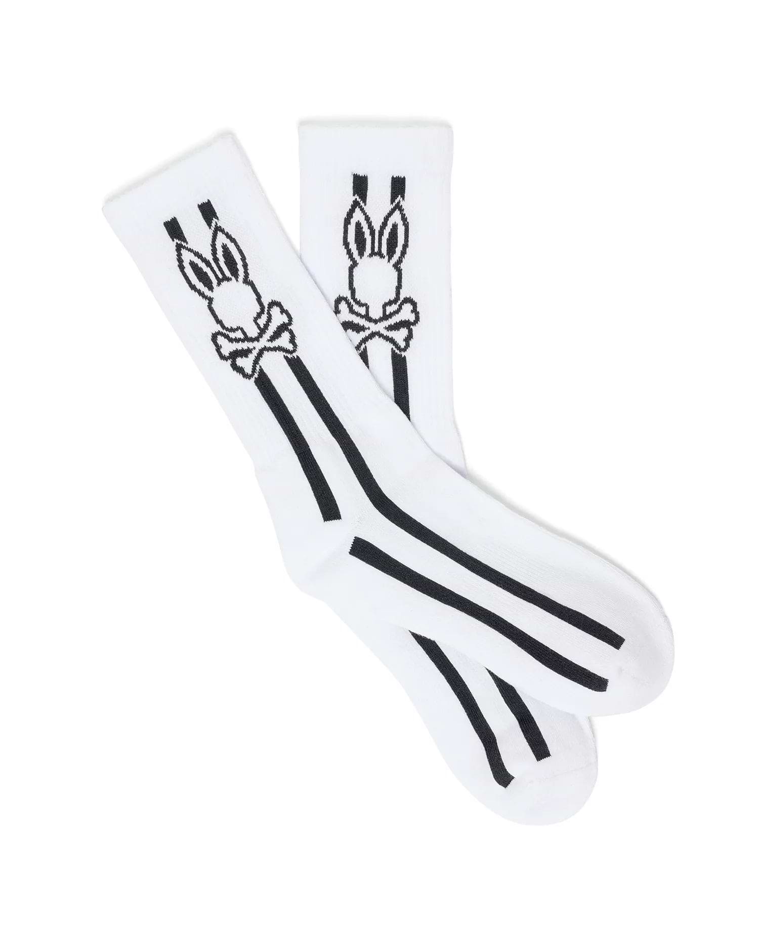 White Mens Ty Sport Sock featuring the iconic black Psycho Bunny skull and crossbones logo prominently on the upper cuff, with three bold black vertical stripes below.