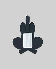 The Psycho Bunny MENS RACKET BUNNY LUGGAGE TAG (MO2400003) features a dark, bunny-shaped silicone design with a white info label and simple strap, shown on a plain light gray background. (2)