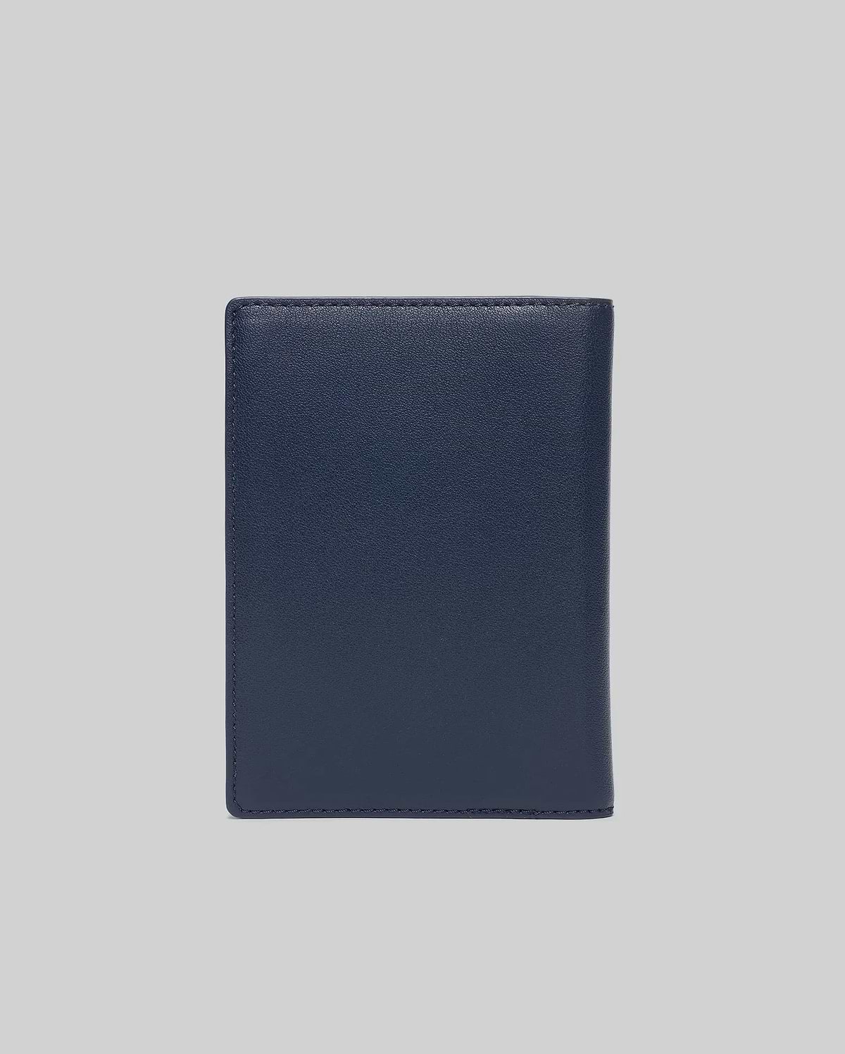 Premium Navy Passport Holder by Psycho Bunny, crafted from smooth, fine-grain leather with precise tonal stitching along the edges, offering a refined and durable travel accessory.