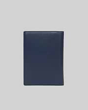 Premium Navy Passport Holder by Psycho Bunny, crafted from smooth, fine-grain leather with precise tonal stitching along the edges, offering a refined and durable travel accessory.