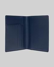 Navy Blue Grained Faux Leather Passport Holder, featuring a refined, open design with multiple interior card slots and a subtly embossed Psycho Bunny logo for premium style.
