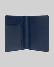 Navy Blue Grained Faux Leather Passport Holder, featuring a refined, open design with multiple interior card slots and a subtly embossed Psycho Bunny logo for premium style.