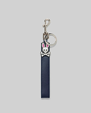 Premium Navy Blue Leather Bunny Keychain featuring a smooth texture, polished silver hardware, and a small, detailed white and pink Psycho Bunny skull logo charm.