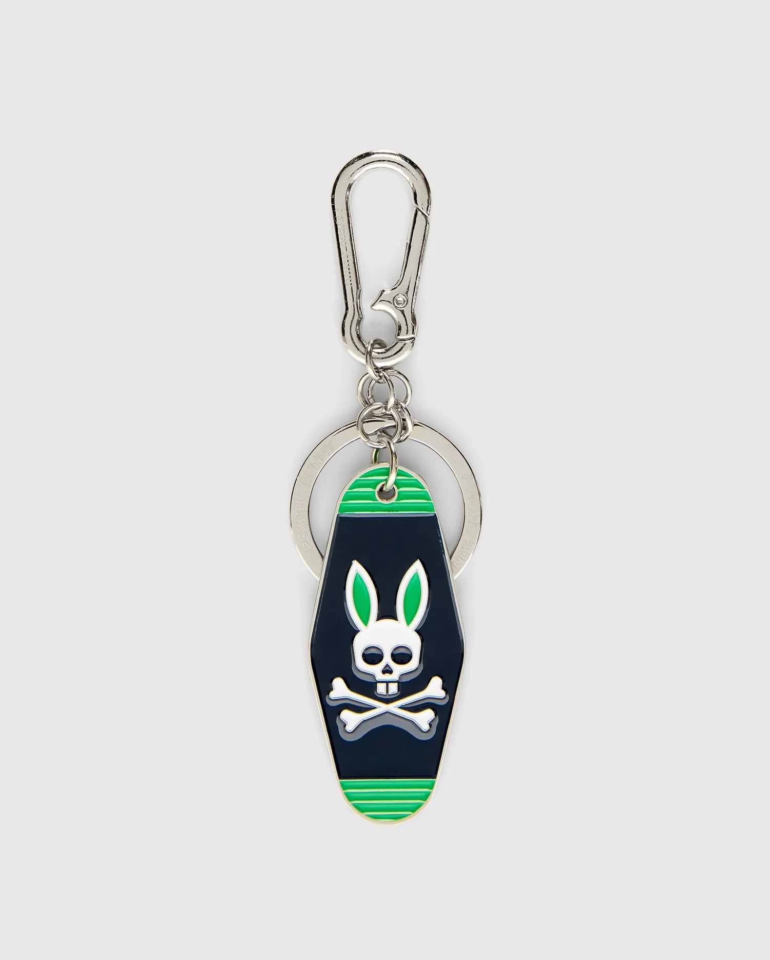 Mens Motel Keychain featuring a dark navy fob with bright green stripes and a prominent white Psycho Bunny skull logo with green ears, attached to a silver carabiner clip and key ring.