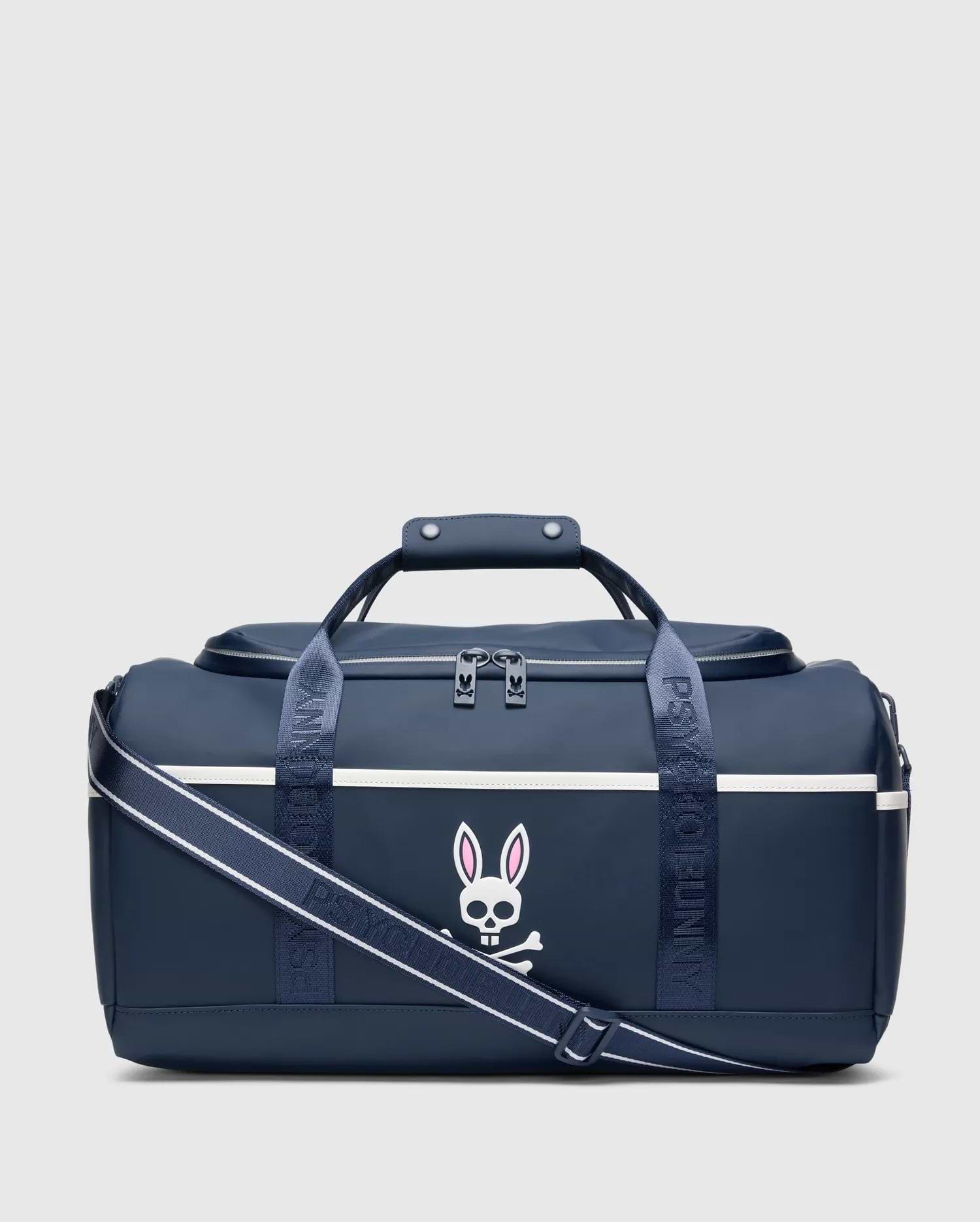 Smooth, durable navy blue Classic Bunny Gym Bag with a large white and pink Psycho Bunny skull logo, white accent stripe, and branded shoulder strap.