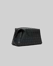 Mens All Over Bunny Toiletry Kit, a sleek black wash bag featuring an all-over tonal Psycho Bunny skull logo pattern and a secure zipper closure.