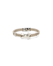 MENS BRAIDED BUNNY PU BRACELET featuring a light taupe braided strap, a central brushed silver Psycho Bunny skull charm, and a secure silver metal clasp. (1)