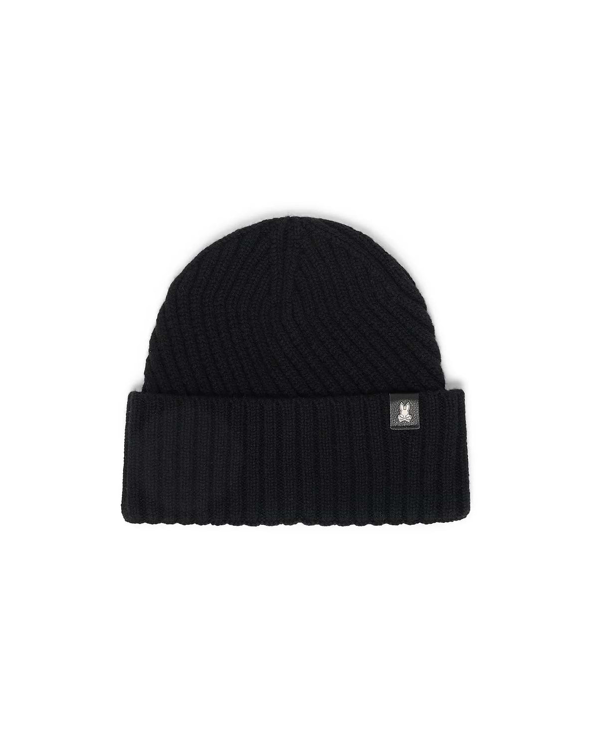 Black Mens Brogan Beanie, a premium ribbed knit beanie featuring a classic folded cuff and a distinctive small white Psycho Bunny skull logo patch on the front.