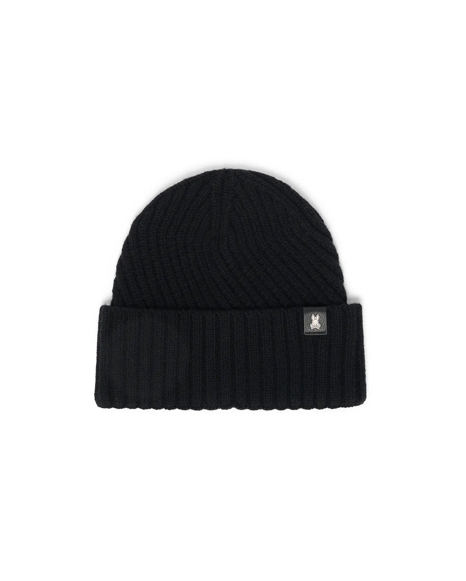 Black Mens Brogan Beanie, a premium ribbed knit beanie featuring a classic folded cuff and a distinctive small white Psycho Bunny skull logo patch on the front.
