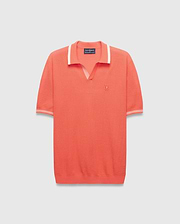 Mens Innis Polo, a vibrant coral knit polo with a V-neck collar and cuffs accented by white stripes, featuring a small embroidered Psycho Bunny skull logo on the left chest. Classic fit. (4)