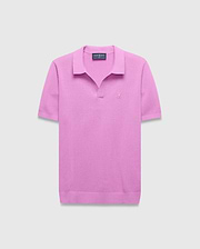 Mens Devon Knit Polo in vibrant pink, featuring a textured knit fabric, classic fit, V-neck placket, and a small tonal embroidered Psycho Bunny skull logo on the left chest.