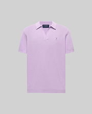 Mens Devon Knit Polo in lavender, featuring a textured knit fabric, open V-neck collar, and a small embroidered Psycho Bunny skull logo on the left chest.