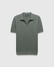 Mens Devon Knit Polo in sage green, a classic fit with textured knit fabric, open collar, and a small tonal embroidered Psycho Bunny skull logo on the left chest.