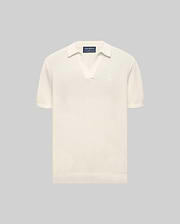 Cream Mens Devon Knit Polo with a textured knit fabric, open collar, short sleeves, ribbed cuffs and hem, featuring a small, tonal embroidered Psycho Bunny skull logo on the left chest.