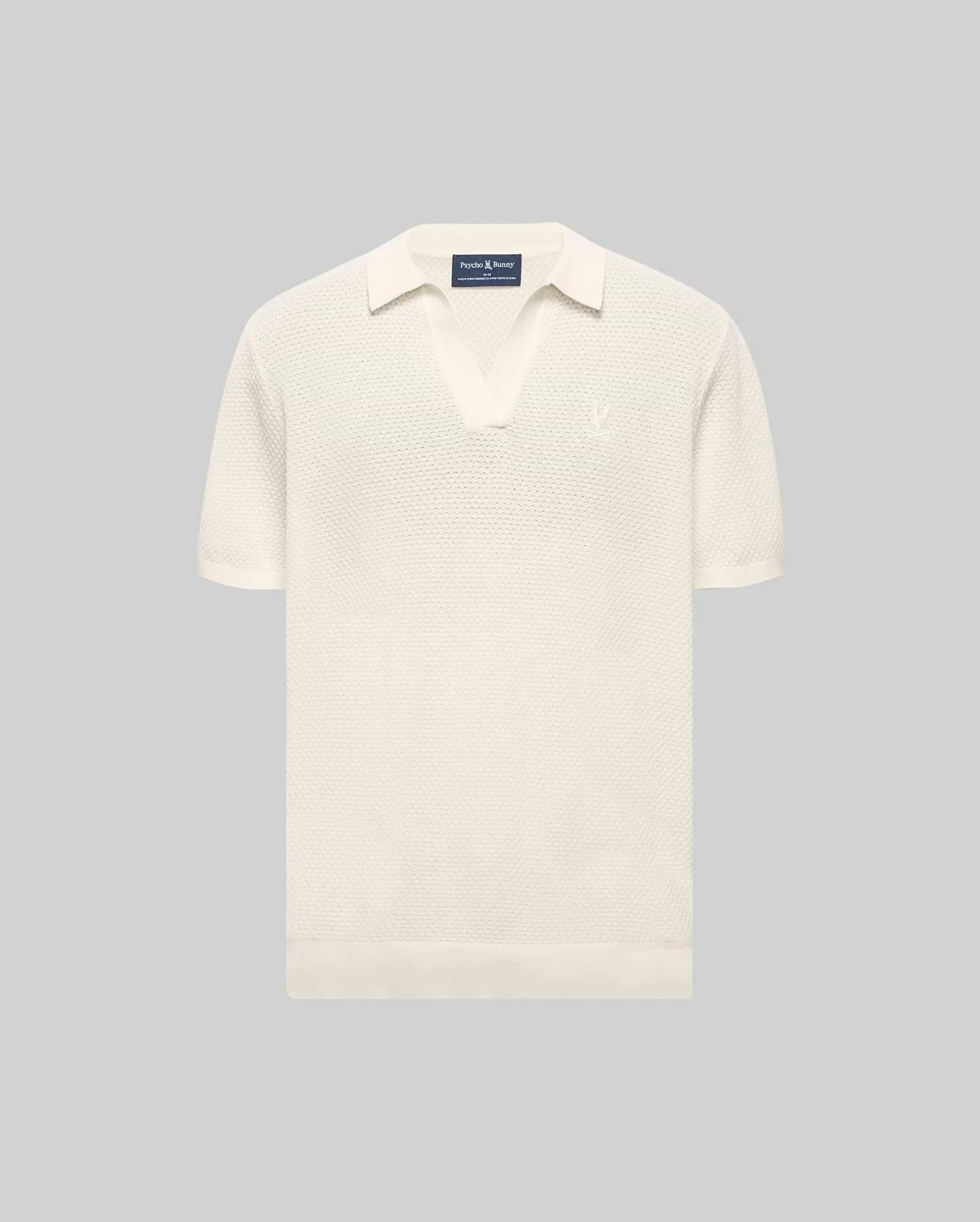 Cream Mens Devon Knit Polo with a textured knit fabric, open collar, short sleeves, ribbed cuffs and hem, featuring a small, tonal embroidered Psycho Bunny skull logo on the left chest.