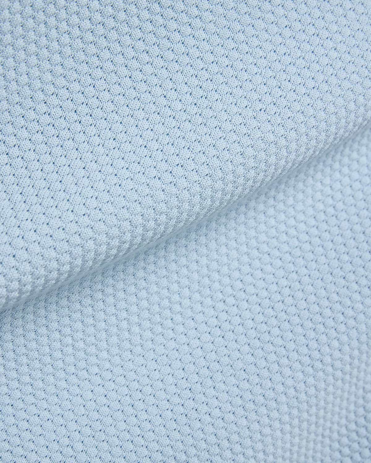 Light blue Mens Devon Bubble Stitch Knit Polo fabric, a premium menswear piece showcasing its unique, refined bubble stitch knit texture, perfect for sophisticated streetwear.
