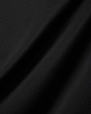 MENS EDWIN SPORT POLO in premium black pique fabric, featuring a classic fit and the signature embroidered Psycho Bunny skull logo on the chest, embodying refined streetwear style.