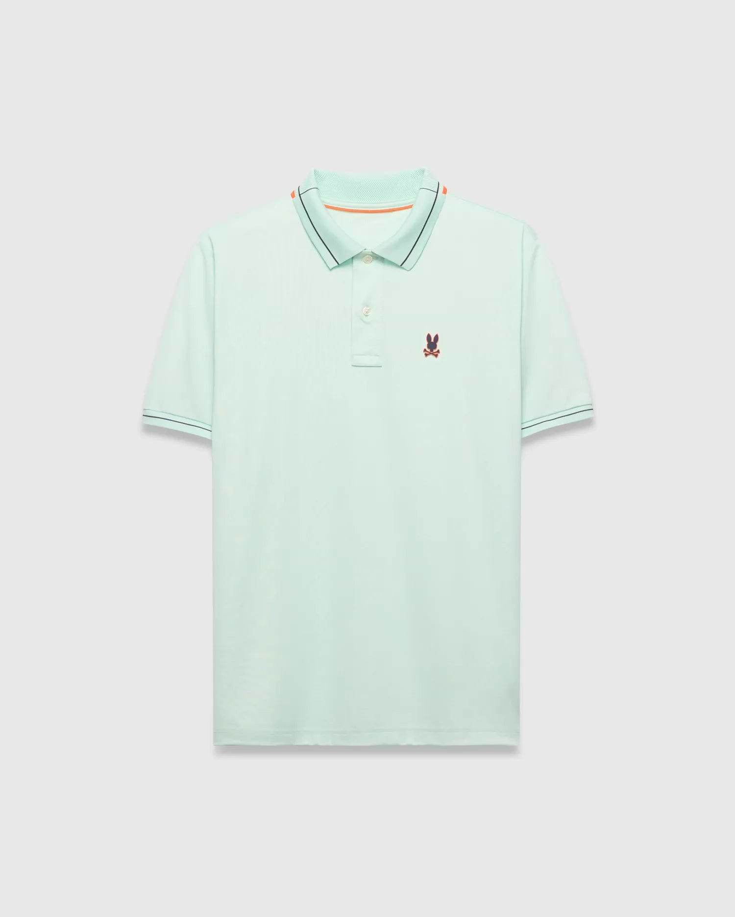 Mens Edwin Sport Polo, a classic fit light green pique polo with a black and orange striped collar, matching black striped cuffs, and a small embroidered Psycho Bunny skull logo on the left chest.