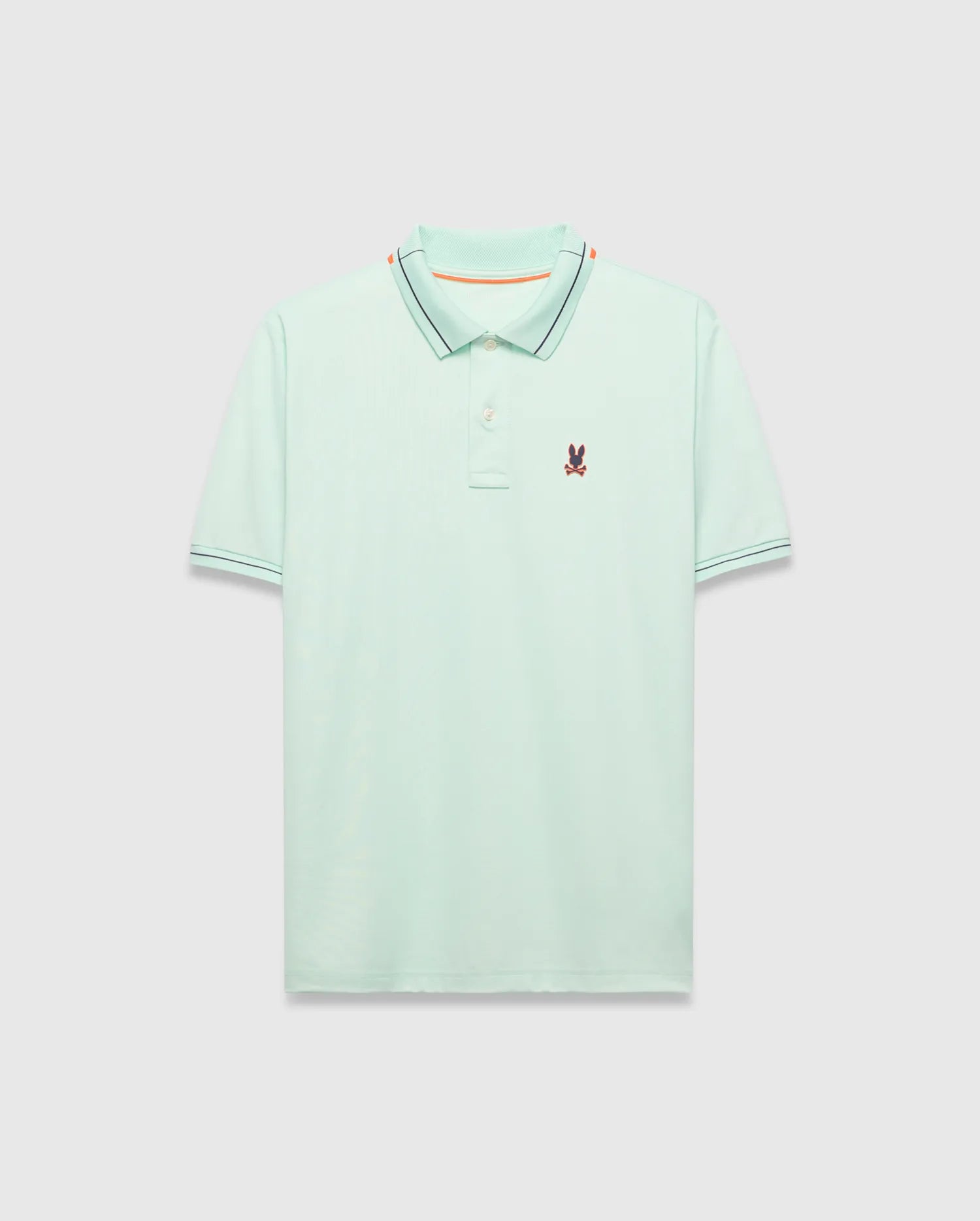 Mens Edwin Sport Polo, a classic fit light green pique polo with a black and orange striped collar, matching black striped cuffs, and a small embroidered Psycho Bunny skull logo on the left chest.
