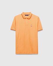 Mens Holden Pique Polo, vibrant orange classic fit pique knit with orange and white tipped collar and cuffs, featuring a small embroidered orange Psycho Bunny skull logo on the left chest.