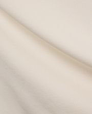 Cream Mens Holden Pique Polo, showcasing its textured pique knit fabric and the iconic small embroidered Psycho Bunny skull logo on the chest.