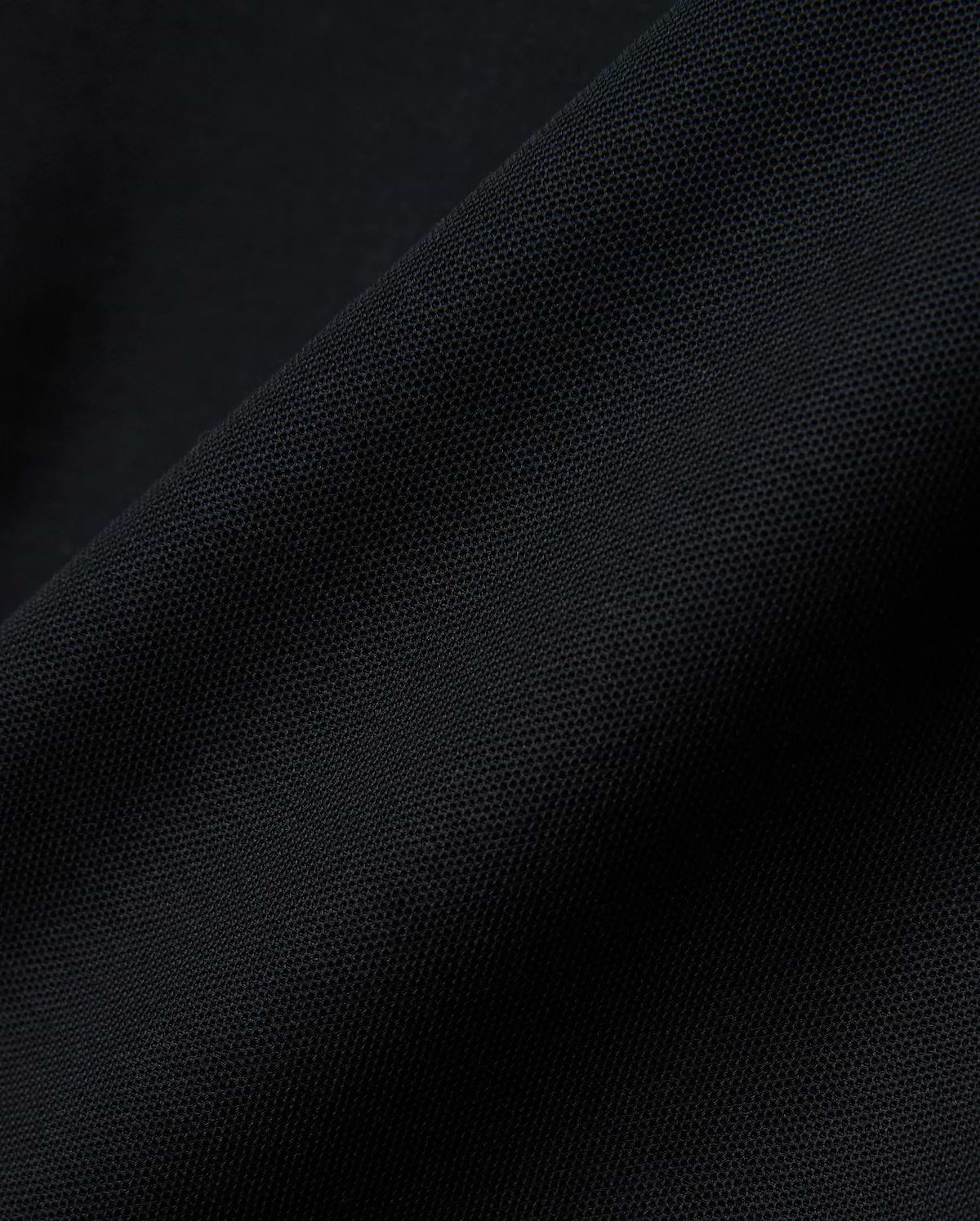 Black MENS NATE PIQUE POLO, a classic fit staple, featuring a refined textured pique weave and the iconic small embroidered Psycho Bunny skull logo on the left chest.