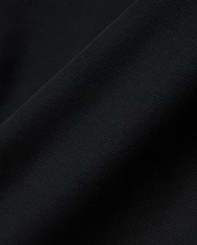 Black MENS NATE PIQUE POLO, a classic fit staple, featuring a refined textured pique weave and the iconic small embroidered Psycho Bunny skull logo on the left chest.