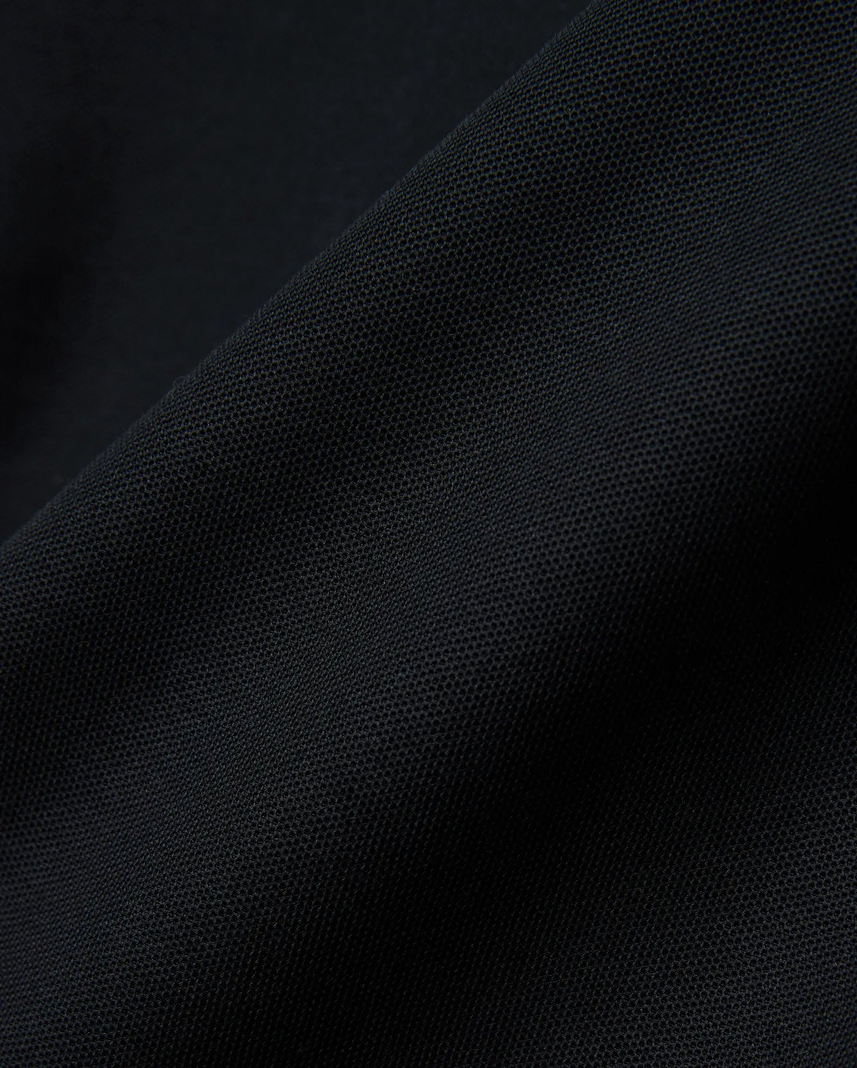 Black MENS NATE PIQUE POLO, a classic fit staple, featuring a refined textured pique weave and the iconic small embroidered Psycho Bunny skull logo on the left chest.