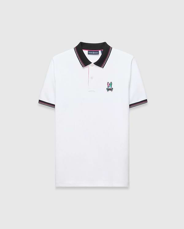 Mens Nate Pique Polo, classic fit, white pique fabric with a black ribbed collar and cuffs with pink/white stripes. A small, embroidered pink, teal, and black Psycho Bunny skull logo on the left chest.