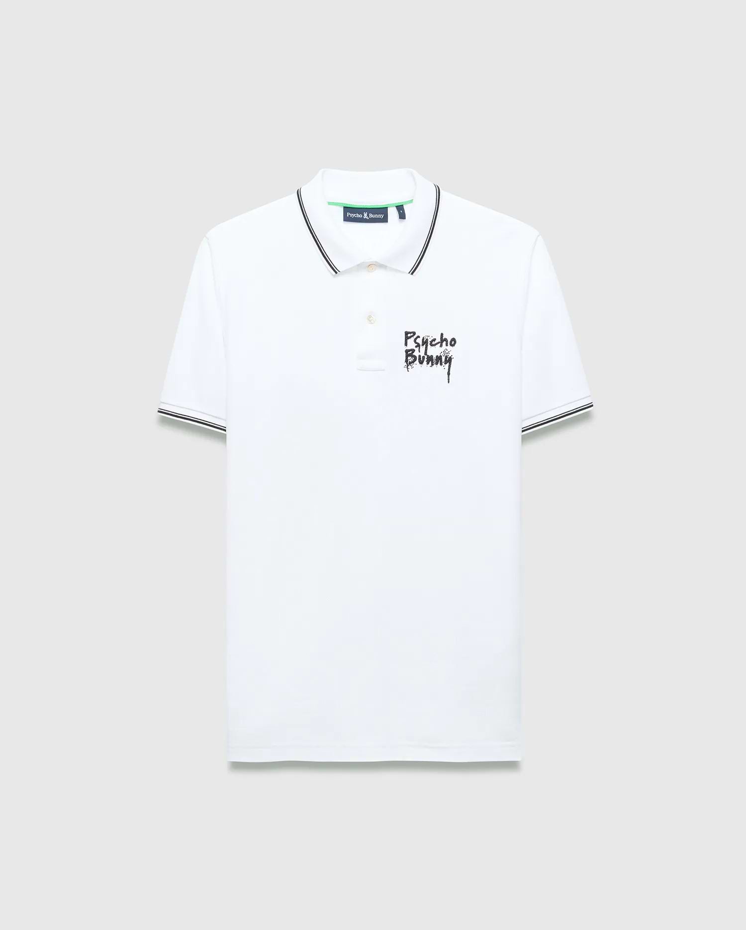 Mens Duncan Pique Polo, white classic fit pique polo with black striped collar and cuffs, featuring a distressed black Psycho Bunny text logo embroidered on the left chest and green neck tape.