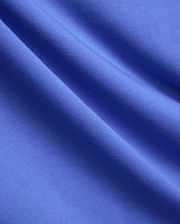 Mens Ridley Pique Polo in a vibrant royal blue, showcasing its refined, breathable pique knit fabric texture, embodying Psycho Bunny's premium streetwear style.