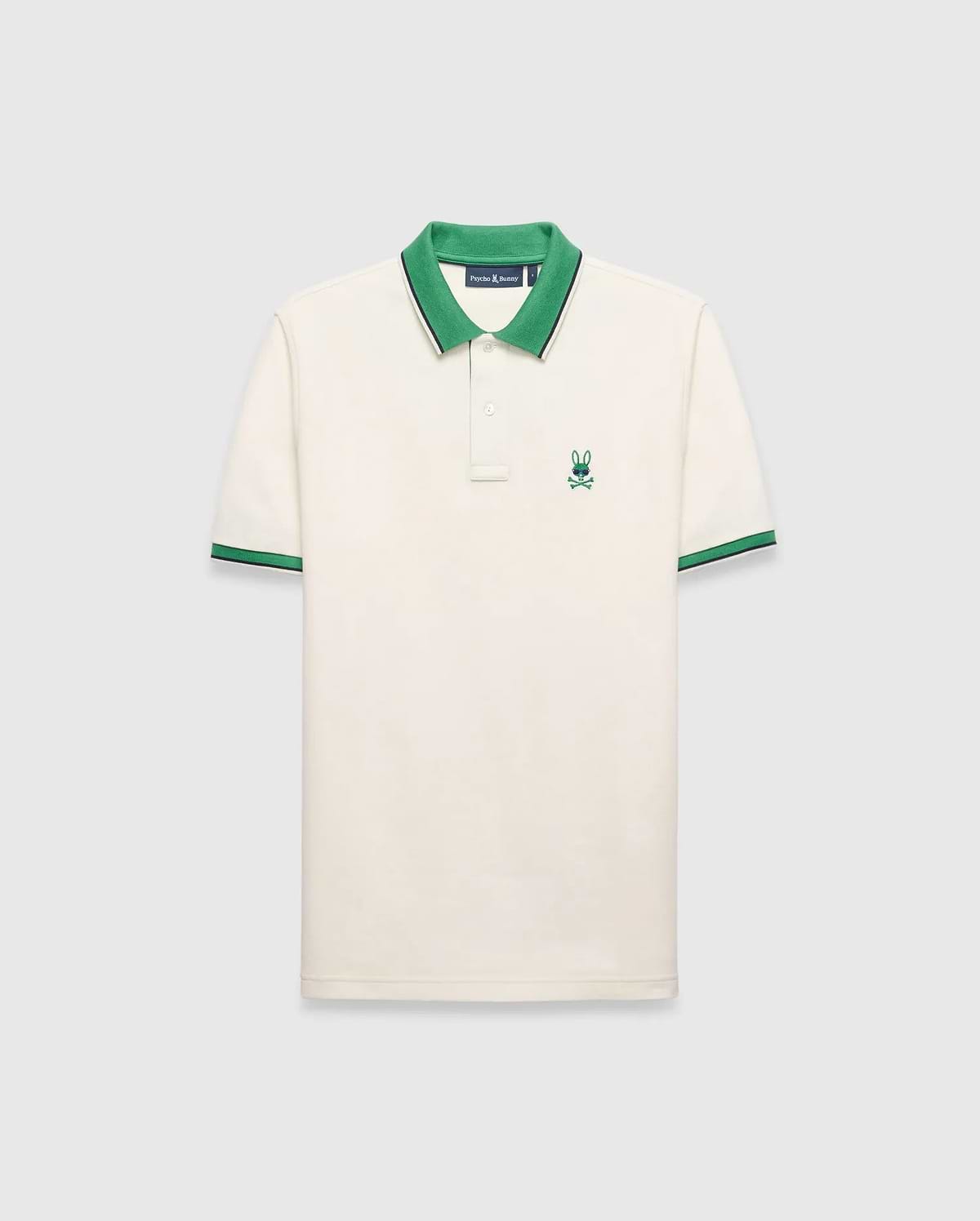 Mens Sunny Pique Polo, cream classic fit pique knit with a green collar and striped cuffs, featuring a small embroidered green Psycho Bunny skull logo on the left chest.