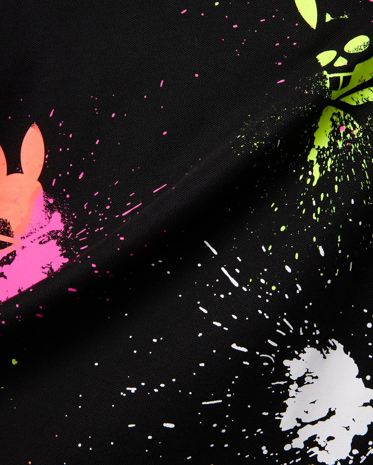 Mens Quintin Aop Pique Polo in black pique fabric, showcasing a bold all-over paint splatter print in neon pink, green, and white, with integrated Psycho Bunny skull logos.