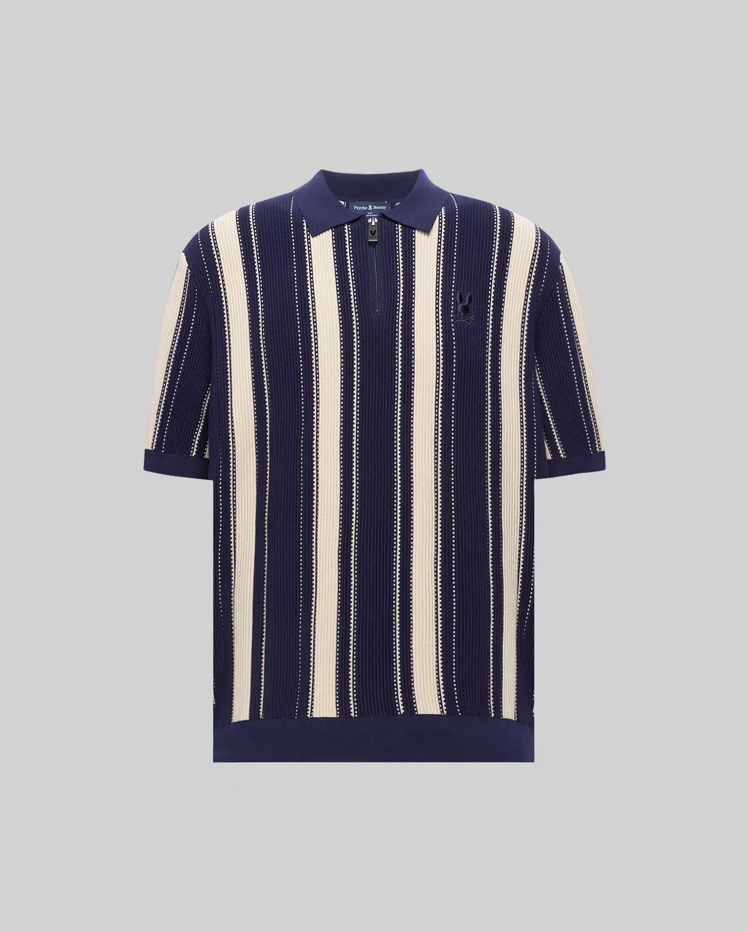 Mens Cliff Knit Zip Polo in navy and cream vertical stripes, featuring a relaxed fit, ribbed knit texture, quarter-zip placket, and a small embroidered Psycho Bunny skull logo on the left chest. (4)