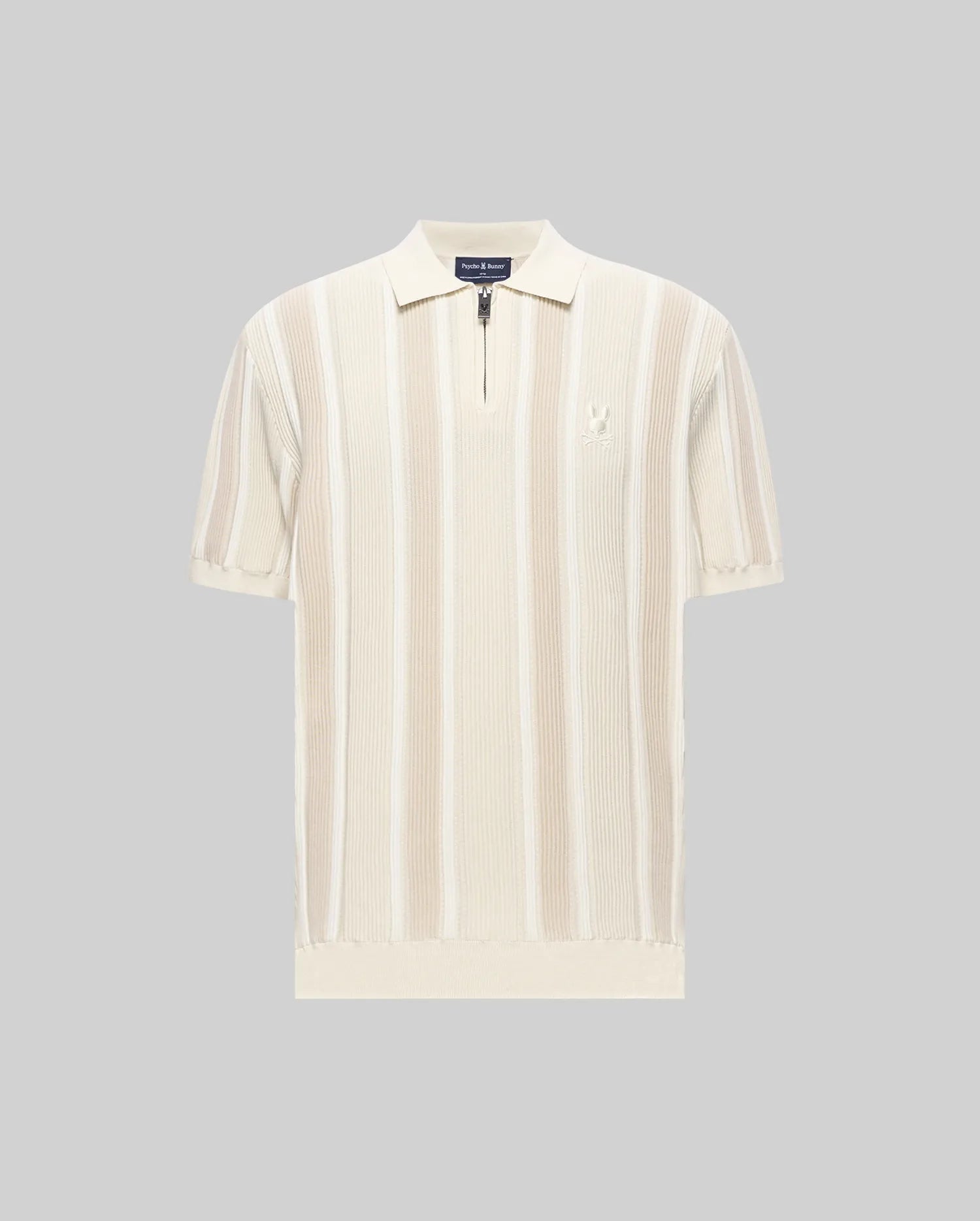 Mens Cliff Knit Zip Polo in cream with lighter cream vertical stripes, featuring a ribbed knit texture, quarter-zip placket, classic fit, and a small embroidered Psycho Bunny skull logo on the left chest.