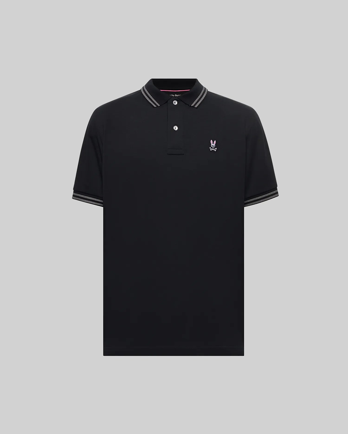 Mens Kenyon Lightweight Pique Polo, black classic fit with white striped collar and cuffs, featuring a small embroidered pink Psycho Bunny skull logo on the left chest.