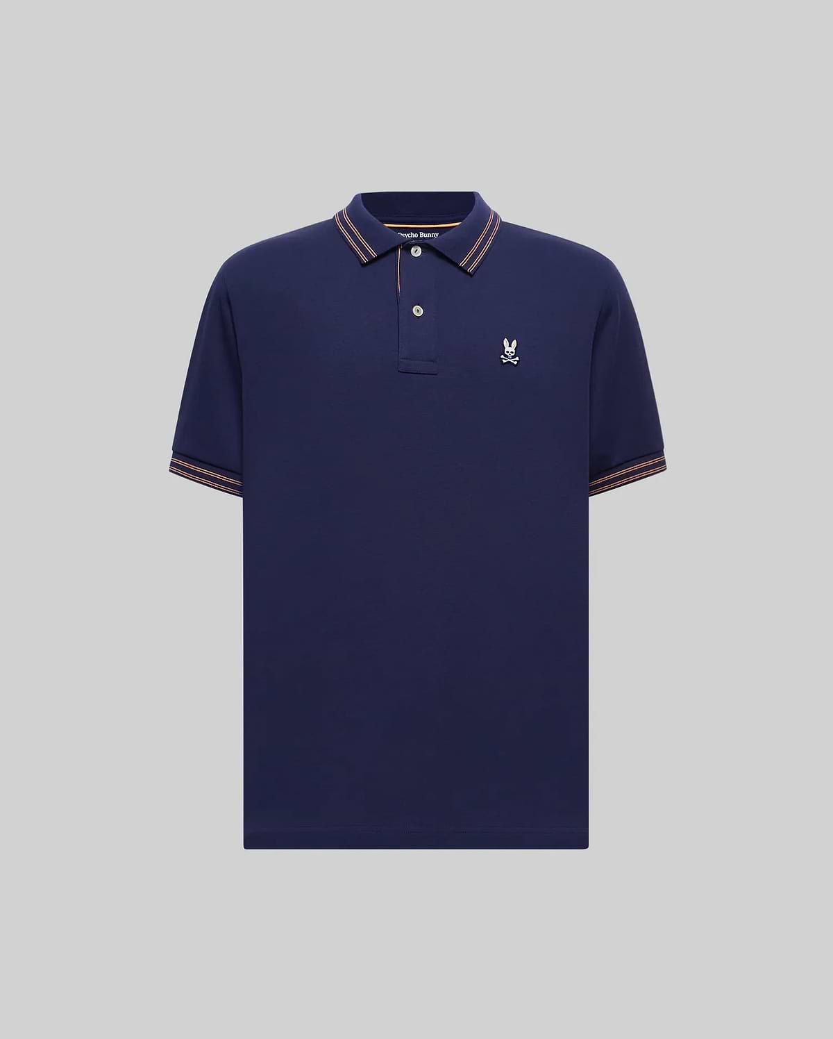 Mens Kenyon Lightweight Pique Polo in navy, featuring a classic fit, pique fabric, orange-brown and white striped collar and cuffs, and a small white embroidered Psycho Bunny skull logo on the left chest.