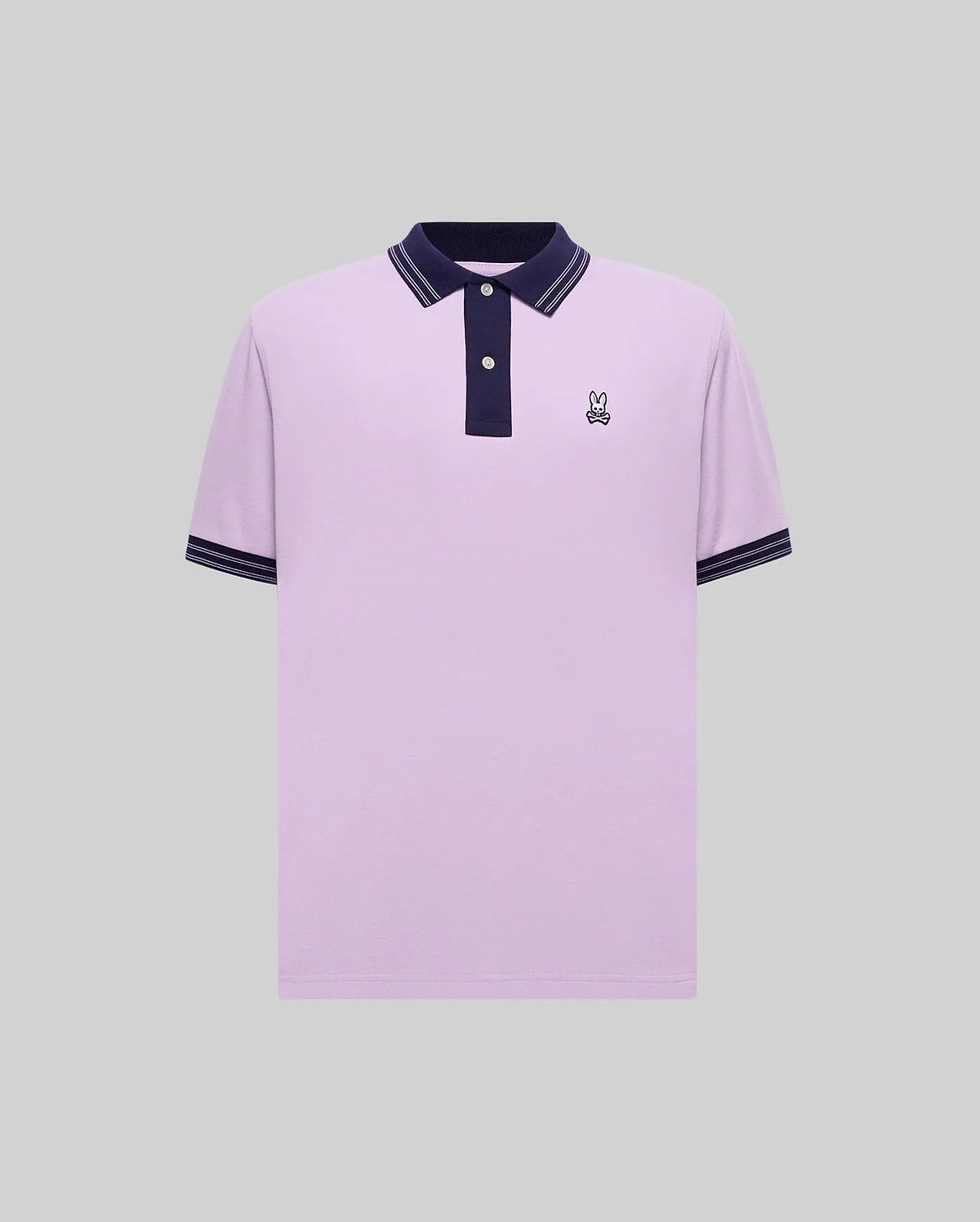 Mens Kenyon Lightweight Pique Polo in lavender, featuring a navy collar, placket, and sleeve cuffs with white tipping, and a small embroidered Psycho Bunny skull logo on the left chest. (5)
