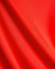 Vibrant red pique knit fabric for the Mens Odin Zip Sport Polo, a premium Psycho Bunny piece, showcasing its distinctive textured weave, ideal for refined streetwear.
