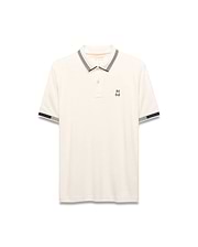 Mens Timmy Interlock Polo, cream interlock knit with navy and white striped collar and cuffs, featuring a small embroidered Psycho Bunny skull logo on the left chest.