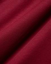 Mens Timmy Interlock Polo in a luxurious deep burgundy, highlighting the premium, smooth interlock knit fabric with its refined, subtle texture and elegant, soft drape.