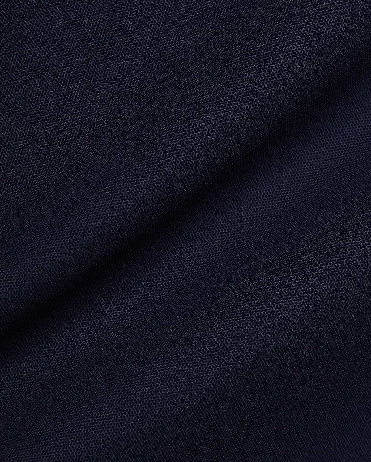 Navy Mens Jaydon Pique Polo, a premium streetwear essential, featuring a classic pique knit texture and the iconic embroidered Psycho Bunny skull logo on the left chest.