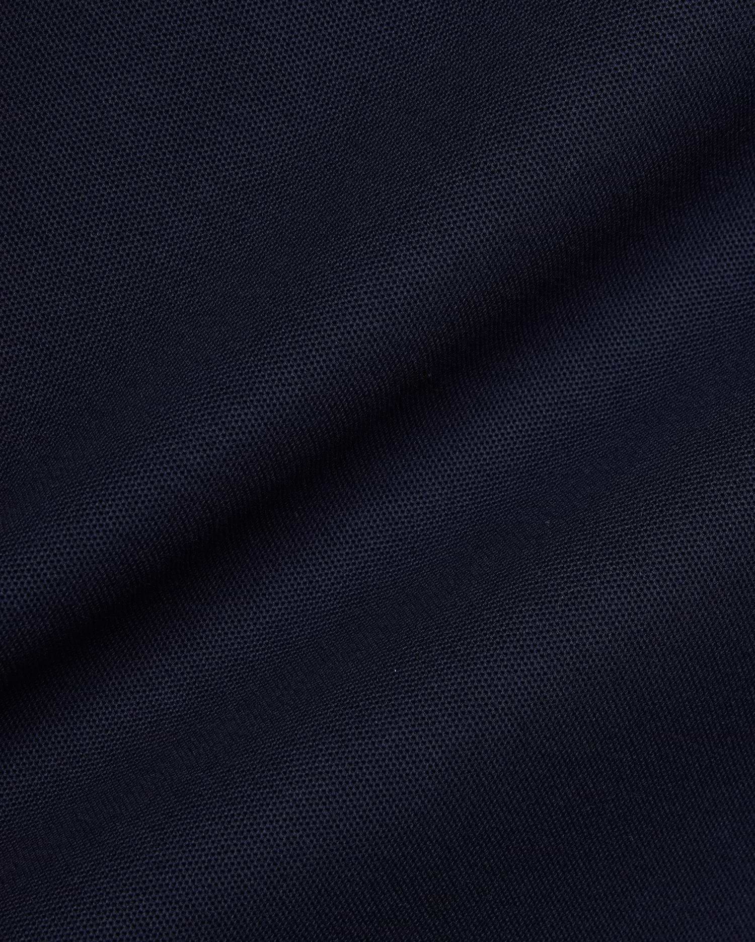 Navy Mens Jaydon Pique Polo, a premium streetwear essential, featuring a classic pique knit texture and the iconic embroidered Psycho Bunny skull logo on the left chest.