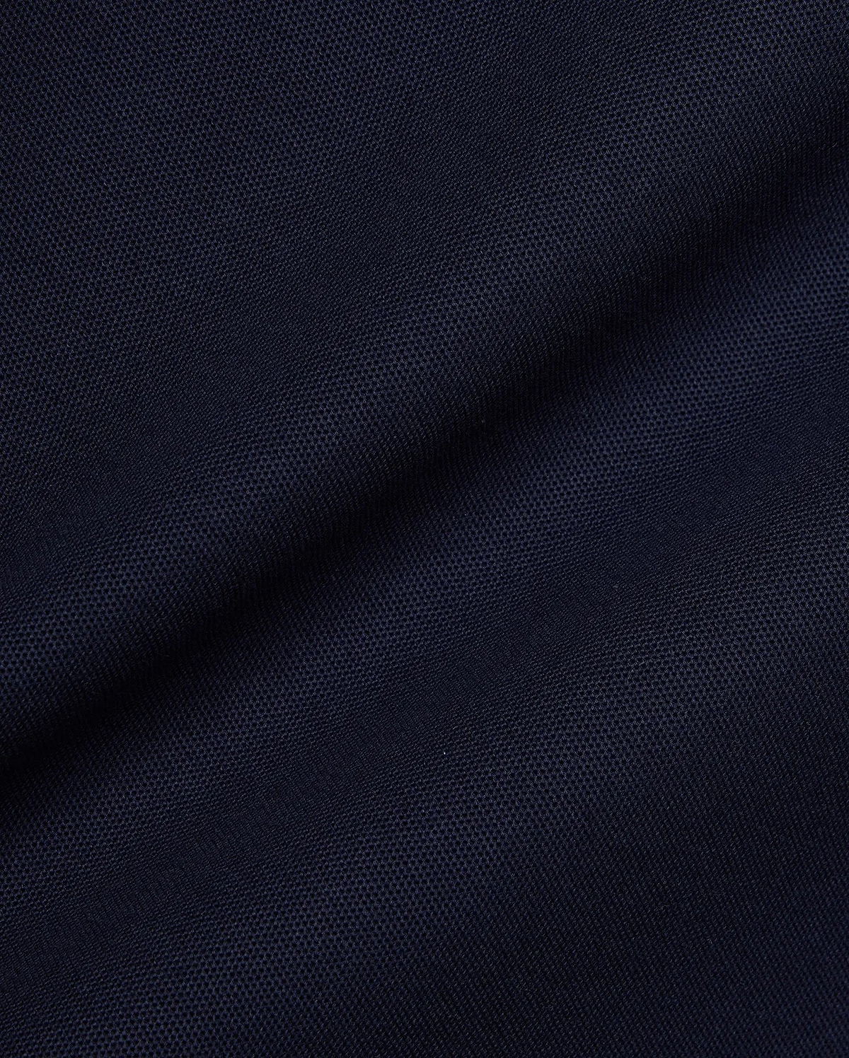 Navy Mens Jaydon Pique Polo, a premium streetwear essential, featuring a classic pique knit texture and the iconic embroidered Psycho Bunny skull logo on the left chest.