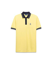 Mens Jaydon Pique Polo in bright yellow, featuring a navy blue collar with white tipping, a two-button placket, ribbed cuffs with matching stripes, and a small embroidered Psycho Bunny logo on the left chest for a classic fit.