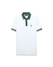 Mens Jaydon Pique Polo in white pique, featuring a dark green collar and placket. It has striped green cuffs and a small, embroidered green Psycho Bunny skull logo on the left chest, offering a classic fit.